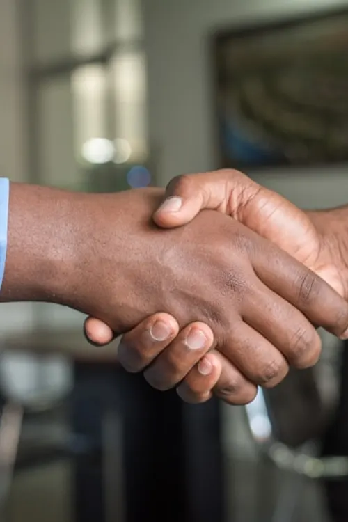 A handshake, illustrating trust